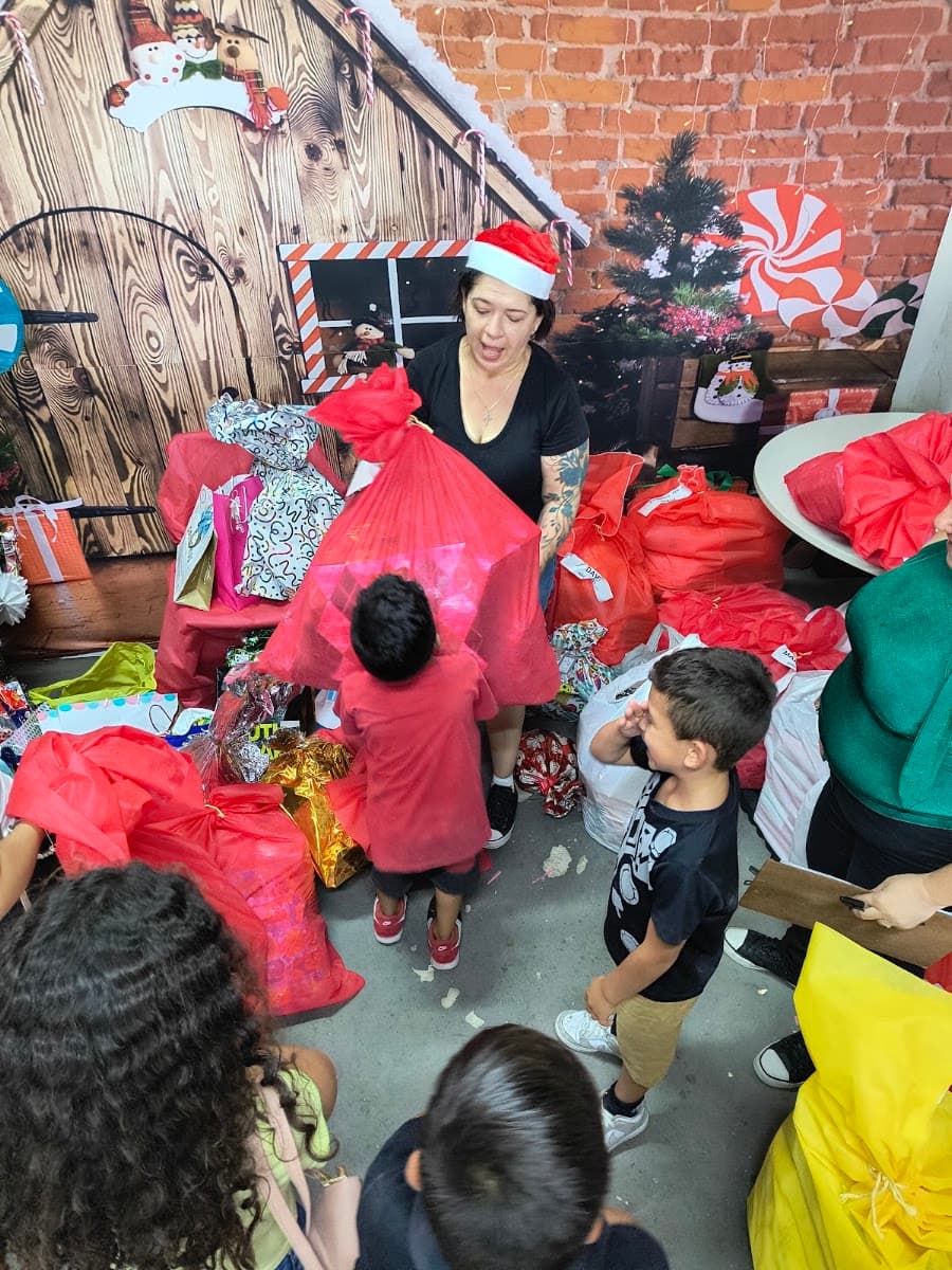 Famílias reunidas em atividade coletiva de encerramento — registro 057