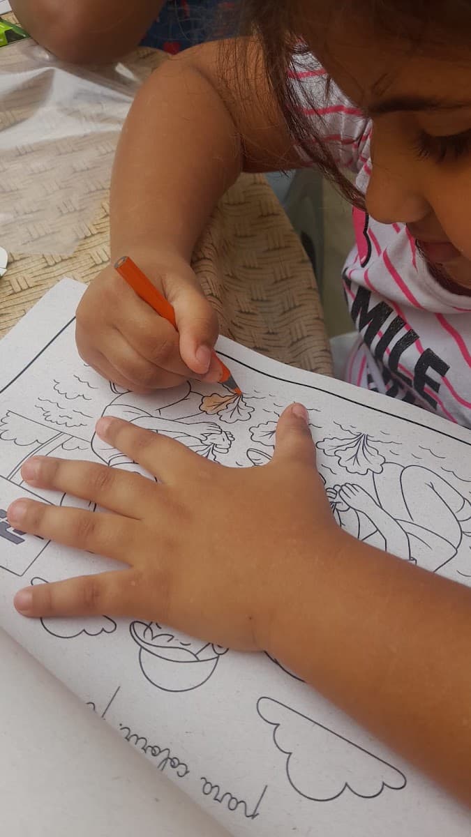 Voluntários orientando uma oficina prática da ACAI — registro 143
